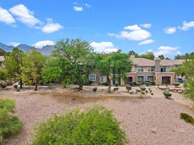 664 Peachy Canyon Cir Unit 103, Las Vegas, NV 89144 - view of front of property with a mountain view and stucco siding