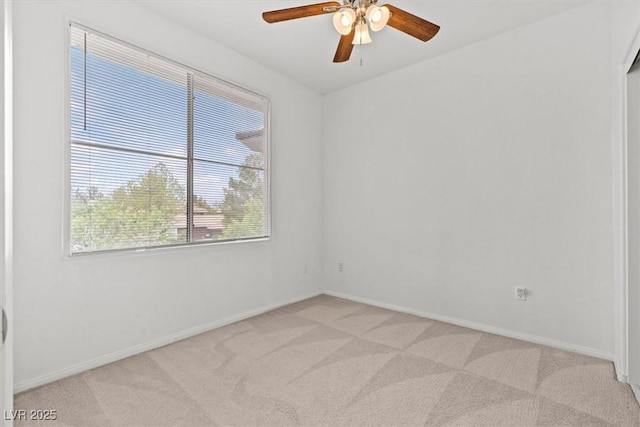664 Peachy Canyon Cir Unit 103, Las Vegas, NV 89144 - spare room featuring light colored carpet and a ceiling fan
