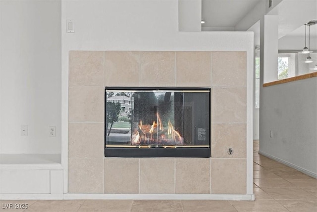 664 Peachy Canyon Cir Unit 103, Las Vegas, NV 89144 - detailed view of a tiled fireplace and baseboards