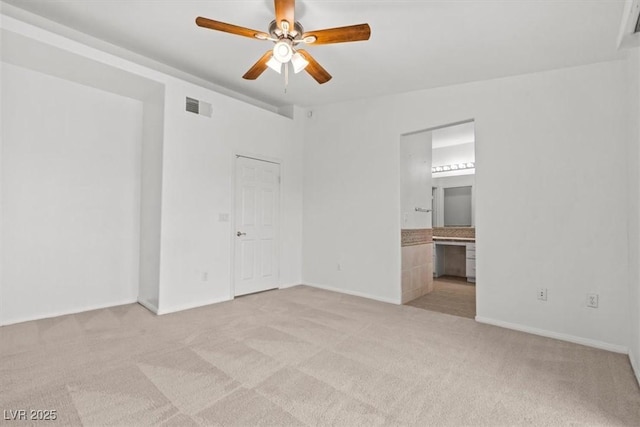664 Peachy Canyon Cir Unit 103, Las Vegas, NV 89144 - empty room featuring light colored carpet and a ceiling fan