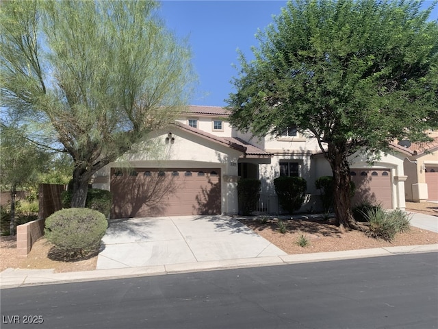 3328 White Bark Pine St, Las Vegas, NV 89129 - view of front of home featuring driveway, stucco siding, an attached garage, and a tile roof
