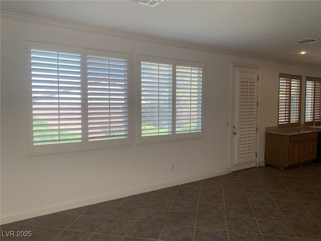 3328 White Bark Pine St, Las Vegas, NV 89129 - spare room with ornamental molding and plenty of natural light