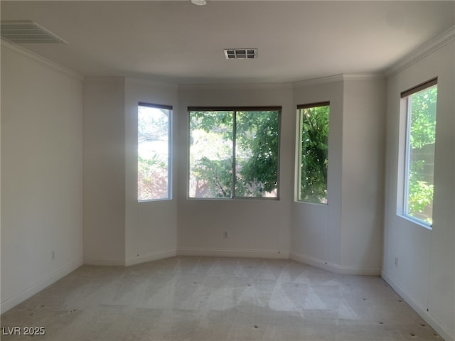 3328 White Bark Pine St, Las Vegas, NV 89129 - spare room with ornamental molding and light colored carpet