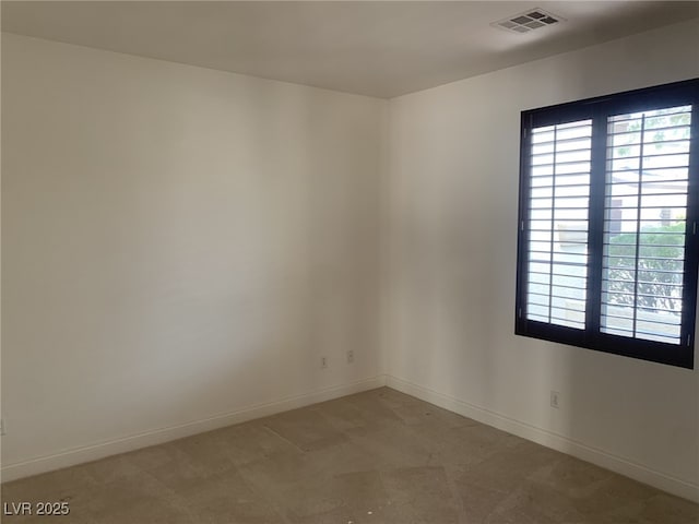 3328 White Bark Pine St, Las Vegas, NV 89129 - spare room featuring light colored carpet and baseboards
