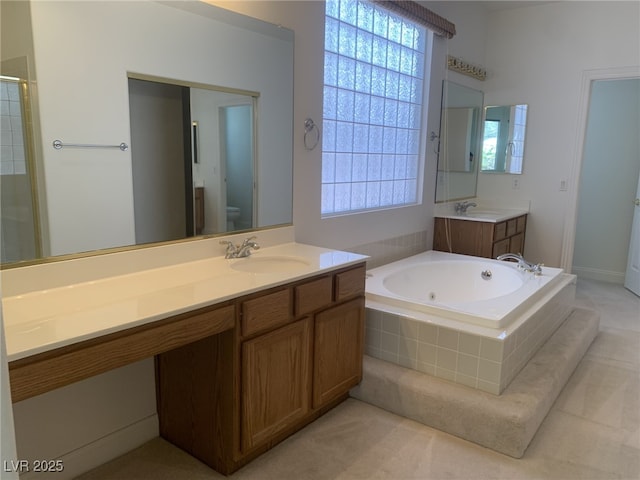 3328 White Bark Pine St, Las Vegas, NV 89129 - full bathroom with vanity, a tub with jets, and a shower with shower door