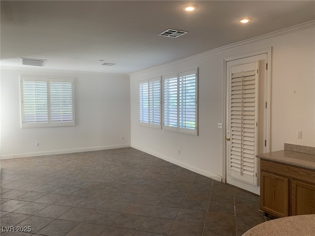 3328 White Bark Pine St, Las Vegas, NV 89129 - spare room with ornamental molding, healthy amount of natural light, and recessed lighting