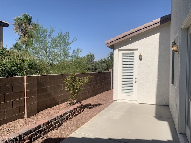 3328 White Bark Pine St, Las Vegas, NV 89129 - fenced backyard with a patio