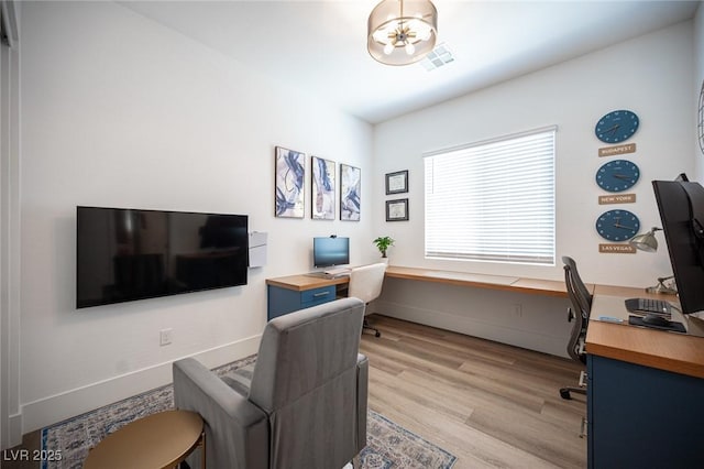 11248 Rebel Dome Ct, Las Vegas, NV 89141 - office area with light wood-style floors and baseboards
