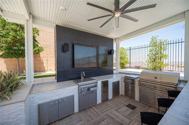 11248 Rebel Dome Ct, Las Vegas, NV 89141 - view of patio featuring an outdoor kitchen and a ceiling fan