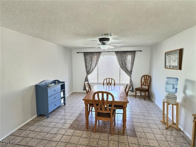 3585 Winner Dr, Las Vegas, NV 89120 - dining room with ceiling fan, a textured ceiling, and light tile patterned flooring
