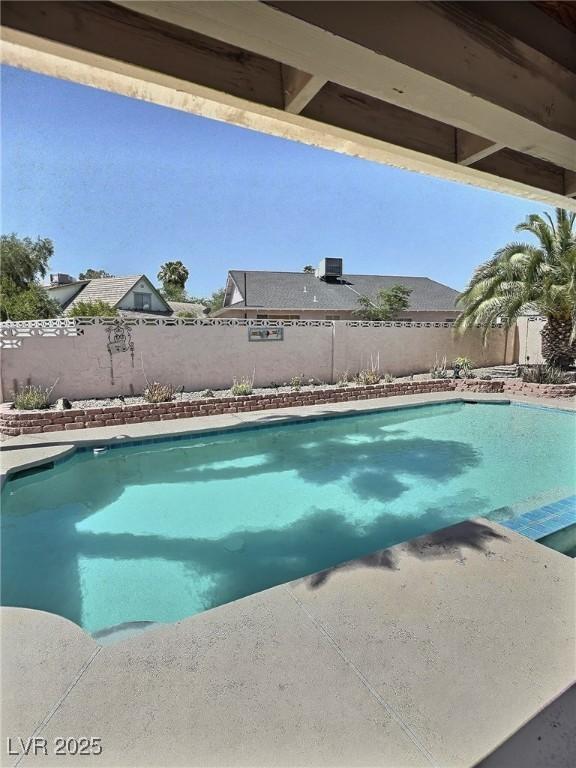 3585 Winner Dr, Las Vegas, NV 89120 - view of pool with a fenced backyard