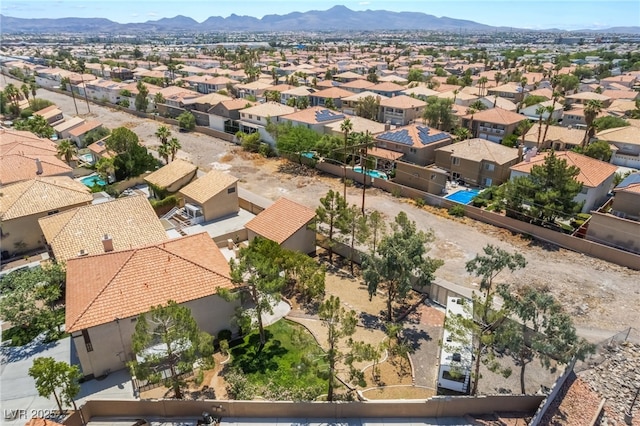 1403 Graystone Canyon Ave, Las Vegas, NV 89183 - aerial perspective of suburban area featuring a mountainous background