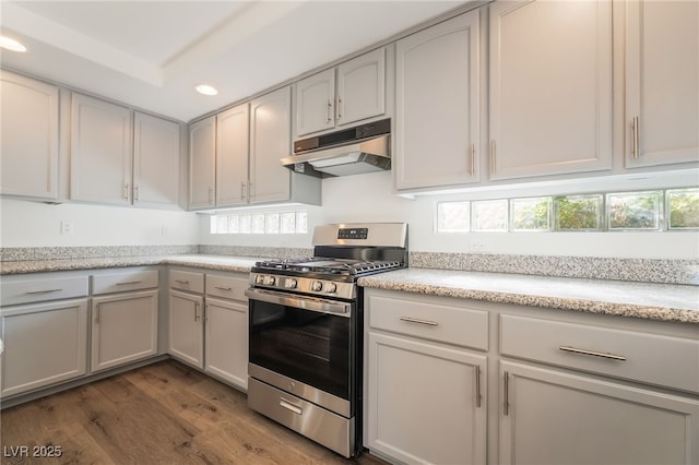 1403 Graystone Canyon Ave, Las Vegas, NV 89183 - kitchen with stainless steel gas range oven, under cabinet range hood, recessed lighting, dark wood-style floors, and gray cabinets