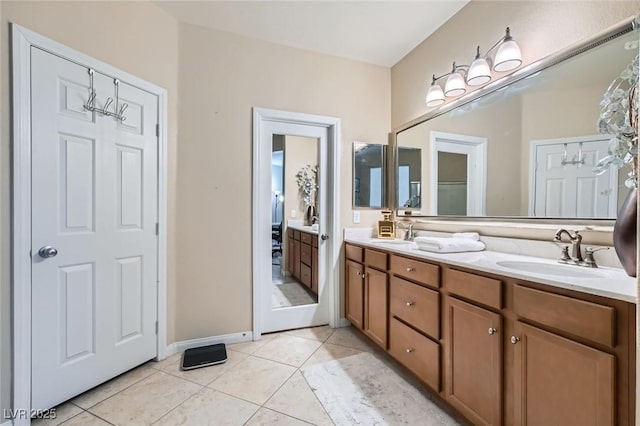 3605 Sapphire Sea Ct, North Las Vegas, NV 89031 - bathroom with double vanity and tile patterned floors