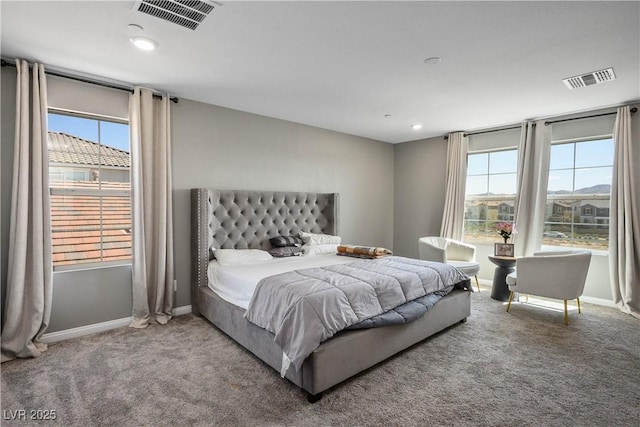 2577 Tolmezzo St, Henderson, NV 89044 - carpeted bedroom with multiple windows and recessed lighting