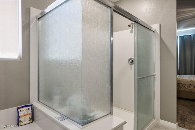 2577 Tolmezzo St, Henderson, NV 89044 - bathroom featuring a shower with door