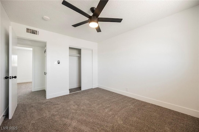 716 Vincent Way, Las Vegas, NV 89145 - unfurnished bedroom featuring carpet floors, a textured ceiling, a closet, and a ceiling fan