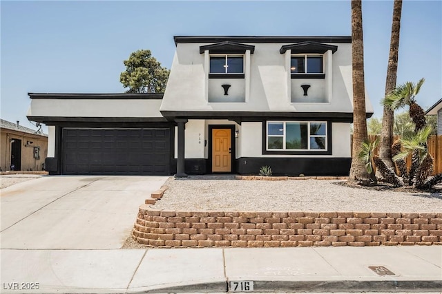716 Vincent Way, Las Vegas, NV 89145 - view of front of house featuring stucco siding, driveway, and a garage