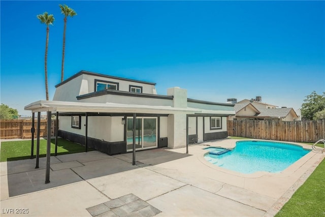 716 Vincent Way, Las Vegas, NV 89145 - back of property featuring stucco siding, a fenced backyard, a patio area, and a pool with connected hot tub