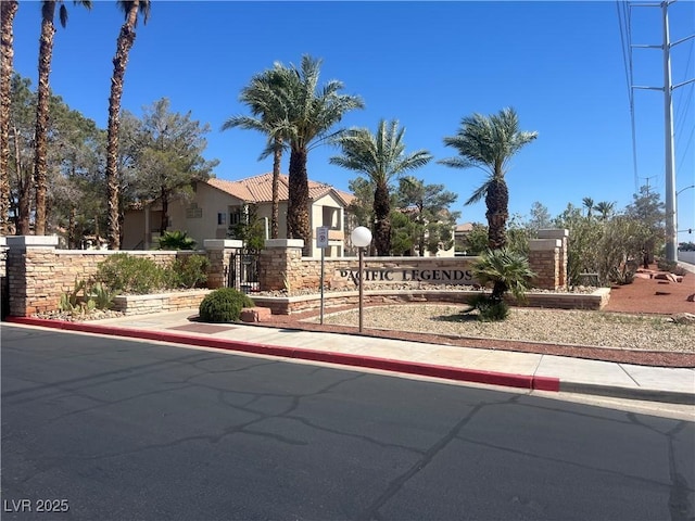 1830 N Buffalo Dr Unit 2021, Las Vegas, NV 89128 - view of front of home featuring stucco siding and a tile roof