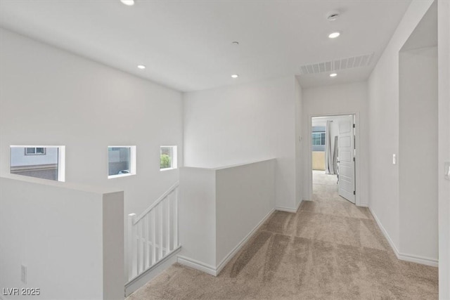 9221 Alden Pointe Ct, Las Vegas, NV 89143 - hall featuring an upstairs landing, carpet floors, recessed lighting, and plenty of natural light