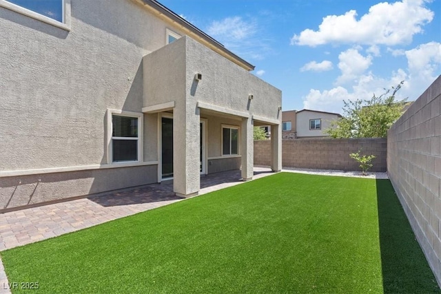 9221 Alden Pointe Ct, Las Vegas, NV 89143 - fenced backyard featuring a patio area