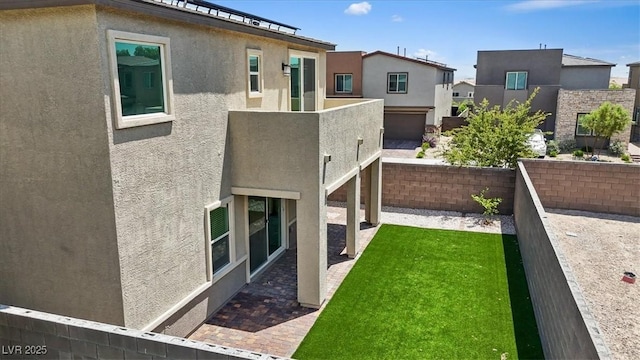 9221 Alden Pointe Ct, Las Vegas, NV 89143 - back of property featuring stucco siding