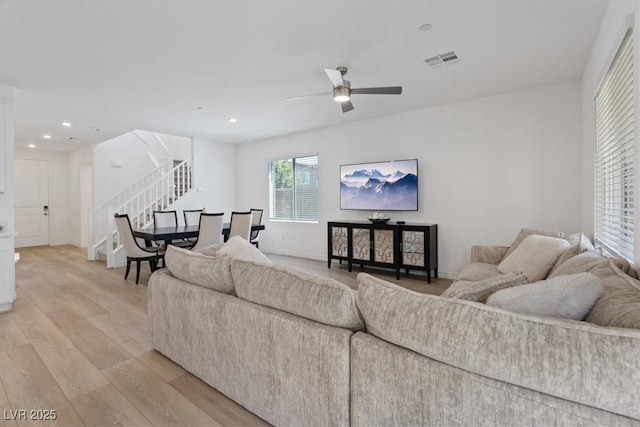 9221 Alden Pointe Ct, Las Vegas, NV 89143 - living area featuring stairs, light wood-style flooring, ceiling fan, and recessed lighting