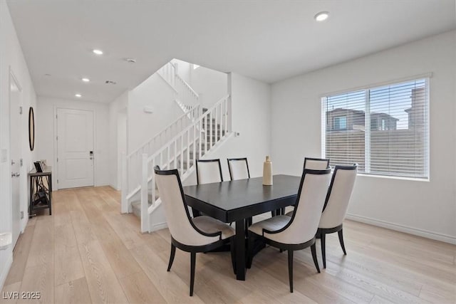 9221 Alden Pointe Ct, Las Vegas, NV 89143 - dining space featuring light wood finished floors, stairs, and recessed lighting