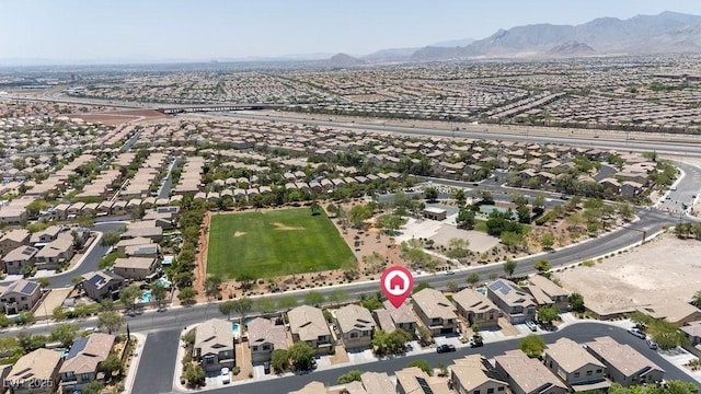 9105 Picket Fence Ave, Las Vegas, NV 89143 - aerial view of property's location featuring nearby suburban area and a mountainous background