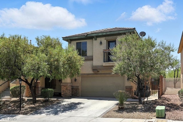 9105 Picket Fence Ave, Las Vegas, NV 89143 - view of front of house featuring concrete driveway, stone siding, a garage, and stucco siding