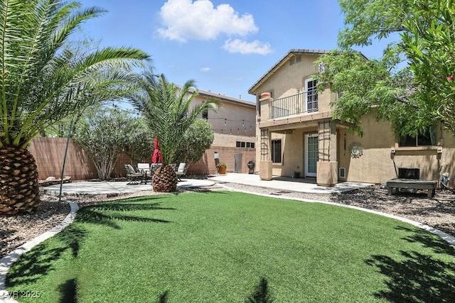 9105 Picket Fence Ave, Las Vegas, NV 89143 - view of yard with a balcony and a patio area