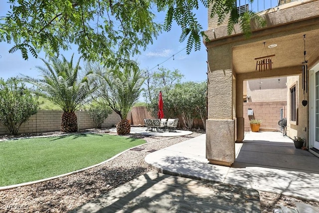 9105 Picket Fence Ave, Las Vegas, NV 89143 - fenced backyard with a patio area