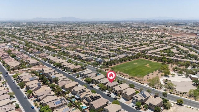 9105 Picket Fence Ave, Las Vegas, NV 89143 - aerial overview of property's location featuring mountains and nearby suburban area
