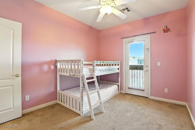 9105 Picket Fence Ave, Las Vegas, NV 89143 - carpeted bedroom with access to exterior and ceiling fan