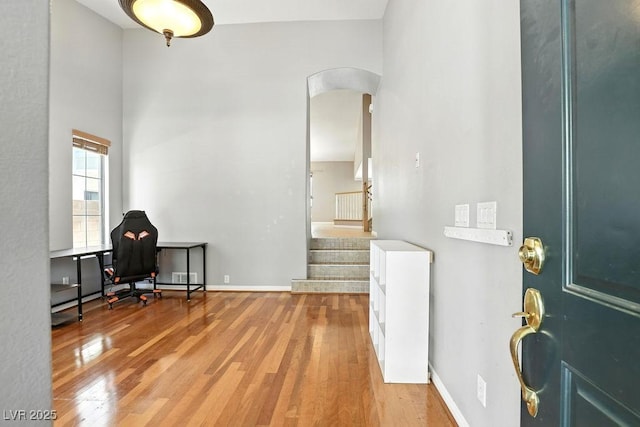 9105 Picket Fence Ave, Las Vegas, NV 89143 - office space featuring arched walkways and light wood-style floors