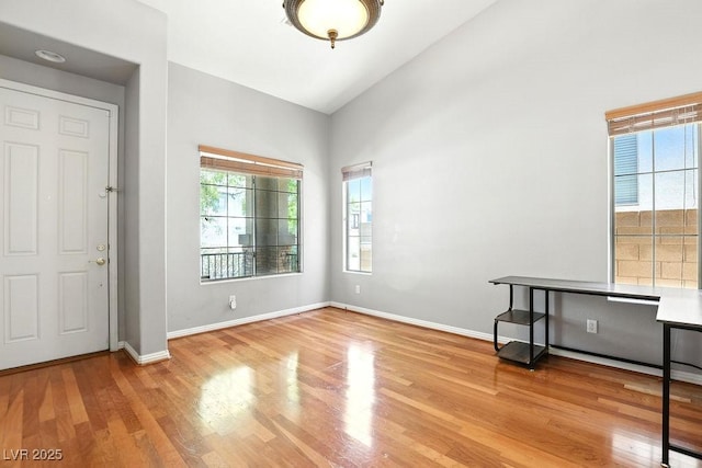 9105 Picket Fence Ave, Las Vegas, NV 89143 - entrance foyer with wood finished floors and high vaulted ceiling