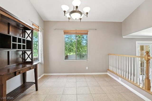 9105 Picket Fence Ave, Las Vegas, NV 89143 - unfurnished dining area featuring a chandelier and tile patterned floors