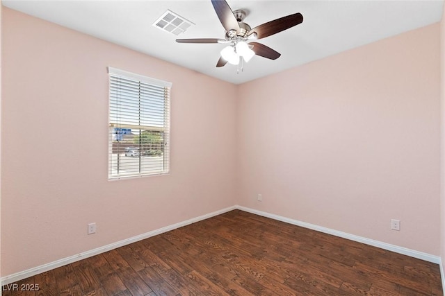 3012 Chiefs Ct, North Las Vegas, NV 89032 - spare room with dark wood-style flooring and a ceiling fan