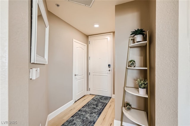 63 E Agate Ave Unit 509, Las Vegas, NV 89123 - doorway featuring light wood finished floors and recessed lighting