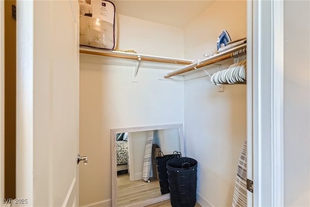 63 E Agate Ave Unit 509, Las Vegas, NV 89123 - walk in closet featuring wood finished floors