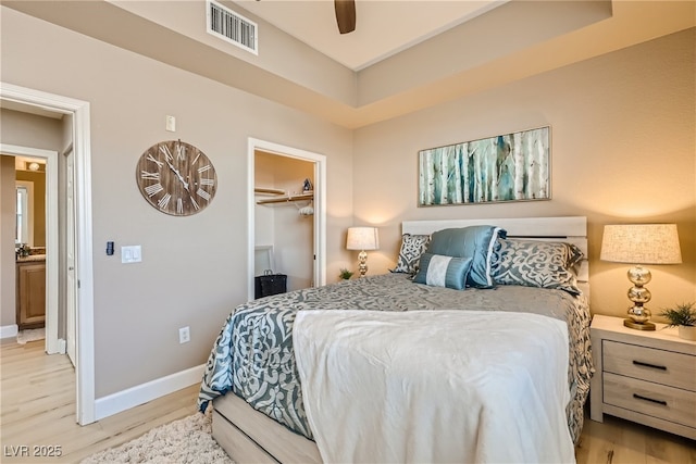 63 E Agate Ave Unit 509, Las Vegas, NV 89123 - bedroom with light wood finished floors, a closet, and ceiling fan