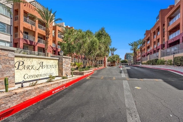 63 E Agate Ave Unit 509, Las Vegas, NV 89123 - view of asphalt street with sidewalks and curbs