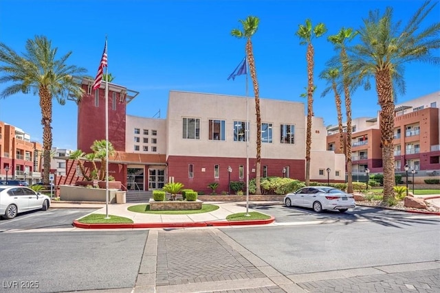 63 E Agate Ave Unit 509, Las Vegas, NV 89123 - view of building exterior with uncovered parking