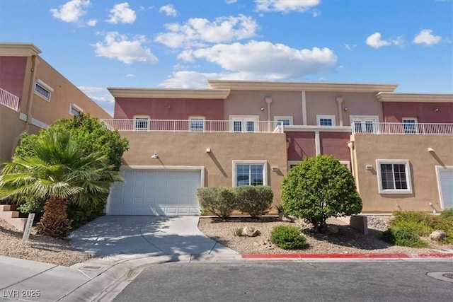 5603 Deer Creek Falls Ct, Las Vegas, NV 89118 - view of front of house with stucco siding, concrete driveway, and a garage