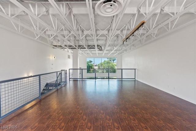 5603 Deer Creek Falls Ct, Las Vegas, NV 89118 - spare room with wood-type flooring and baseboards