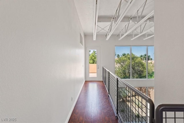 5603 Deer Creek Falls Ct, Las Vegas, NV 89118 - corridor with baseboards and wood finished floors