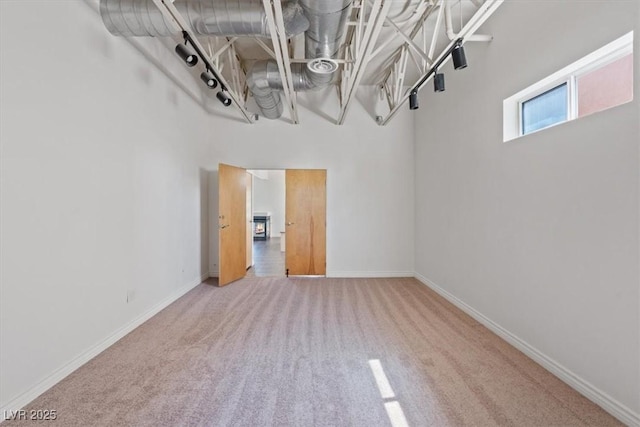 5603 Deer Creek Falls Ct, Las Vegas, NV 89118 - carpeted empty room with baseboards