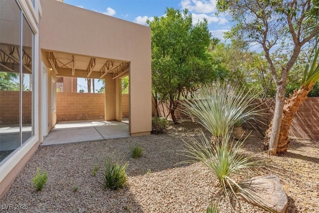 5603 Deer Creek Falls Ct, Las Vegas, NV 89118 - view of yard with a patio