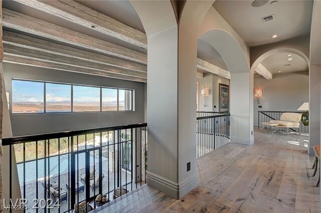 30 Via Tiberius Way, Henderson, NV 89011 - hall with hardwood / wood-style flooring and arched walkways